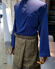 Blue traditional Baju Melayu outfit displayed at Club Man Shop