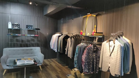 Actual Club Man Shop showroom in USJ Taipan, Subang Jaya, with clothing displays and customer seating
